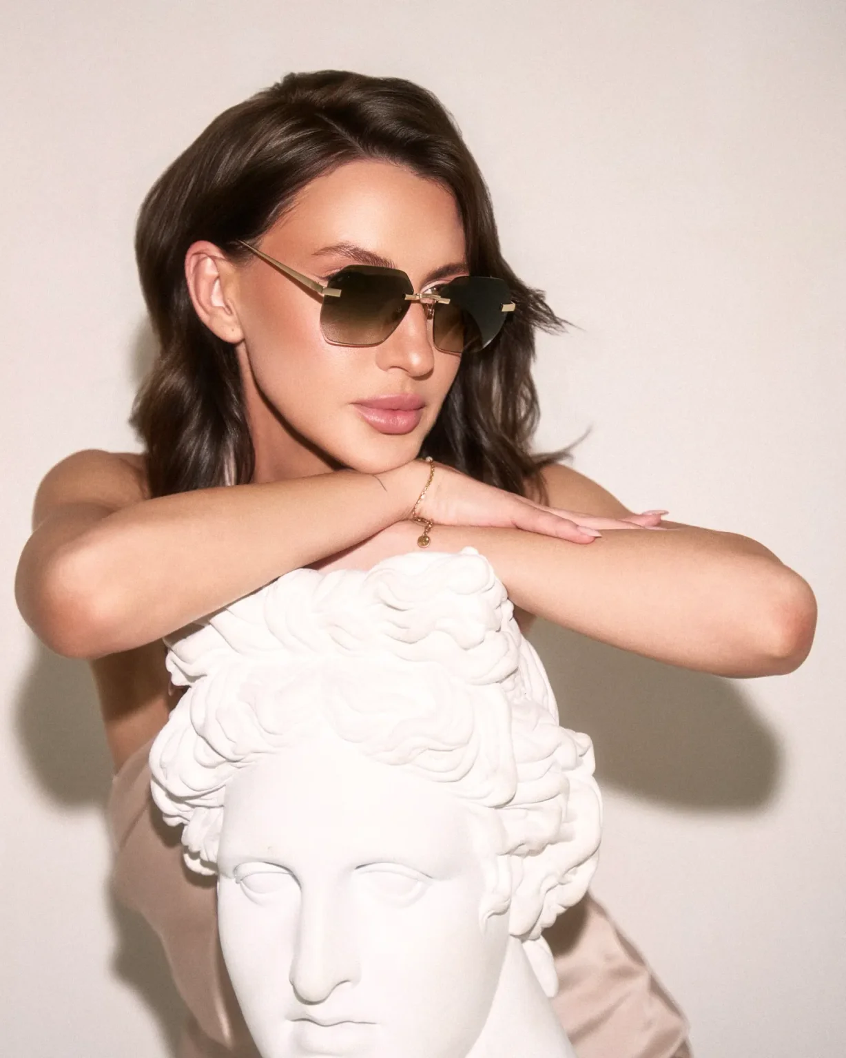 Model wearing Eleven Spectacles - IRIS BRONZE